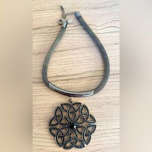 A statement necklace with all crystals intact. Adjustable!